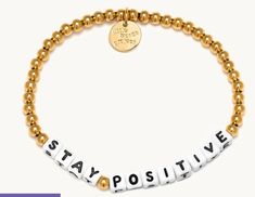 Optimism is best! Shop our 14k waterproof gold “stay positive” beaded bracelet for all the positivity! Connect. Live. Give.Connect your bracelet for exclusive access to Nice Nation's online community. Enjoy early access, exclusive offers, and connect with fellow members. Follow your Word's journey as you pass it on to someone who needs it more. A win all around! Playful Gold Friendship Bracelets With Letter Beads, Everyday Inspirational Bracelet With Letter Beads, Dainty 14k Gold-filled Bracelets With Letter Beads, Positive Word Bracelet, Adjustable 14k Gold-filled Letter Beads Bracelet, Word Bracelet, Stay Positive, Staying Positive, Online Community