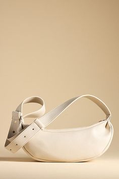 Polyurethane; polyester lining One inner slip pocket One inner zip pocket Zipper styling Imported | Faux-Leather Sling Bag by Anthropologie in Beige, Women's, Polyester/Polyurethane Beige Leather Baguette Bag Pouch, Beige Leather Baguette Bag For On-the-go, Trendy Leather Pouch Baguette Bag, Textured Faux Leather Crossbody Shoulder Bag, Faux Leather Baguette Bag For Everyday Use, Everyday Faux Leather Baguette Bag With Zipper, Chic Faux Leather Shoulder Bag With Zipper Pocket, Soft Leather Baguette Bag For On-the-go, Travel Baguette Bag With Zipper In Faux Leather