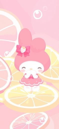 an image of hello kitty with lemons and oranges in the background on this wallpaper