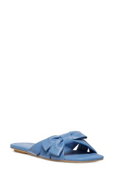 Complete your look with the effortless contemporary charm of a slide sandal embellished with a bold bow detail. Leather upper/synthetic lining/leather and synthetic sole Imported Bow Slides, Blue Steel, Sandal Women, Bow Detail, Slide Sandals, Stuart Weitzman, Sofia, Womens Sandals, Leather Upper