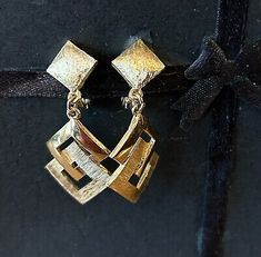 Vintage 1970's Monet Gold Tone Double Diamond Shape Drop Dangle Clip-on-Earrings  | eBay Retro Dangle Jewelry For Formal Occasions, Retro Dangle Earrings For Formal Occasions, Retro Gold Dangle Earrings, Retro Earrings For Evening, Retro Gold Dangle Clip-on Earrings, Vintage Dangle Earrings For Evening, Retro Dangle Jewelry, Retro Pierced Jewelry For Party, Double Diamond