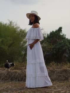 "Boho Wedding Dress, Summer Boho Dress, Off Shoulder Dress Beautiful and breathable 100% cotton fabric perfect for spring/summer. A very flattering dress can be worn in many ways. Available in 2 colors; white or cream Sizing: Made in one size to fit S to XL / US: 4/6/8/10/12/14 Measurement; Chest up to 40\" Pit to pit laying flat 21\" across Top elastic 34-70 around. Waist elastic 24-40\" Hip free Length 54\" hem circumference 454 cm around. **The design best fit a person who is 170 cm or more** Long White Dress Boho, Boho White Dress, Cotton Wedding Dress, White Dress For Women, Summer Boho Dress, White Tiered Dress, Cotton Wedding Dresses, White Bohemian Dress, Dress With Lace Trim