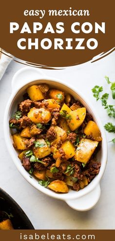 a white bowl filled with mexican paas con chorizzo