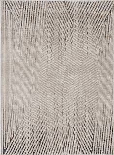 an area rug with lines in grey and white colors on the ground, including one diagonal pattern