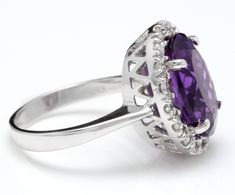 6.25 Carats Natural Amethyst and Diamond 14K Solid White Gold Ring Suggested Replacement Value: $5,200.00 Total Natural Oval Amethyst Weights: Approx. 5.50 Carats Amethyst Measures: Approx. 14.00 x 10.00mm Natural Round Diamonds Weight: Approx. 0.75 Carats (color G-H / Clarity SI1-2) Ring total weight: Approx. 6.4 grams Disclaimer: all weights, measurements and colors are approximate and may vary slightly from the listed dimensions or as seen in the image. All pictures are magnified to show the Formal Purple Brilliant Cut Gemstones, Purple Elegant Gemstones For Formal Occasions, Elegant Purple Gemstones For Formal Occasions, Luxury Purple Amethyst Ring With Halo Setting, Elegant Amethyst Ring With Halo Setting For Formal Occasions, Luxury Amethyst Ring With Halo Setting, Elegant Formal Amethyst Gemstones, Elegant Brilliant Cut Amethyst Ring, Elegant Amethyst Ring With Brilliant Cut