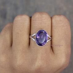 Amethyst Ring, Amethyst Silver Ring, 925 Sterling Silver Ring, Birth Stone Ring, Large Stone, Wedding Ring, Christmas Ring, Gift For Her Item Details:  Gemstone: Amethyst Gemstone Shape: Oval Gemstone Size: 10x14 MM Used Metal: 925 Sterling Silver Metal Color: Silver Band Thickness: 3 MM Ring Weight: 3.60 grams This ring is handcrafted in 925 Sterling silver.  Ring is adorned with handmade design band  and the gemstone is covered with silver.  This rings comes with Natural gemstone!! Wedding Amethyst Crystal Ring Stamped 925, Purple Amethyst Ring Stamped 925 For Promise, Purple Amethyst Promise Ring Stamped 925, Oval Hallmarked Amethyst Promise Ring, Wedding Amethyst Open Ring In Sterling Silver, Oval Amethyst Ring Gift, Oval Purple Amethyst Ring For Gift, Oval Solitaire Amethyst Ring Gift, Purple Hallmarked Crystal Wedding Ring