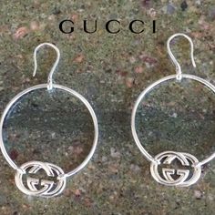 Authentic Gucci, Britt Large Hoop Earrings Style#223322 Britt Collection, Retired Made In Italy New In Box Color: Silver Features: .925 Solid Stamped Sterling Silver With Gucci Authenticity #. Large Round Hoops With French Wire Hooks. Signature Gucci Britt Interlocking Gg Logos Attached. Retired Style No Longer Sold In Stores. Large Size Is Glamorous, Elegant & Timeless. An Essential Sterling Essential For Anyone Who Loves Classic Gucci. Pristine Condition With No Damage, Tarnish Or Flaws. Inclu Gucci White Gold Round Earrings, Gucci Luxury Sterling Silver Earrings, Gucci White Gold Sterling Silver Earrings, Luxury Gucci Sterling Silver Earrings, Gucci Pierced Jewelry Gift, Gucci Pierced Jewelry As Gift, Gucci Sterling Silver Earrings As Gift, Gucci Sterling Silver Earrings For Gift, Elegant Gucci Sterling Silver Earrings