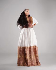 Beautiful Brown Habesha Dress Traditional Long Dress With Traditional Patterns, Traditional Long Kaftan, Traditional Long Fitted Kaftan, Traditional Maxi Dress With Patterns For Eid, Traditional Maxi Dress With Traditional Patterns For Eid, Traditional Fitted Long Kaftan, Traditional Embroidered Maxi Dress, Traditional Maxi Dress With Traditional Patterns For Festive Occasions, Traditional Long Dress With Dabka