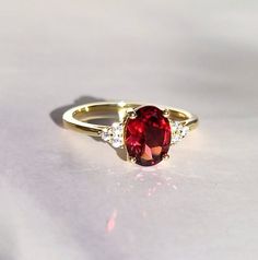 Sterling Silver Natural Garnet Ring Engagement Promise - Etsy Dazzling Oval Ruby Ring, Dazzling Oval Ruby Ring For Anniversary, Red Ruby Cluster Ring With Center Stone, Classic Red Birthstone Ring With Center Stone, Formal Birthstone Ring With Lab-created Ruby, Red Birthstone Ring With Round Cut Center Stone, Dazzling Ruby Ring With Center Stone, Dazzling Round Cut Ruby Ring, Classic Garnet Birthstone Ring