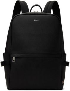 Saffiano regenerated leather backpack in black. · Logo-woven webbing straps throughout · Rolled carry handle · Adjustable shoulder straps · Logo stamp and zip pocket at face · Patch pocket and compression strap at sides · Padded mesh back face · Two-way zip closure · Padded laptop compartment · Zip pocket at interior · Logo-woven satin lining · Silver-tone hardware · H16 x W11 x D4 Supplier color: Black Modern Coated Canvas Backpack With Adjustable Strap, Modern Backpack With Adjustable Strap In Coated Canvas, Modern Black Backpack With Leather Trim, Modern Coated Canvas Backpack, Modern Black Leather Backpack With Leather Trim, Modern Black Leather Backpack With Trim, Modern Saffiano Leather Bag With Leather Trim, Black Coated Canvas Backpack With Adjustable Strap, Business Backpack In Coated Canvas