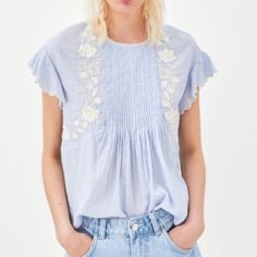 Nwt Zara Size S Blue Striped Embroidered Floral Top Brand New With Tags Round Neck Top With Short Ruffled Sleeves. Features A Buttoned Opening In The Back, Pleats And Embroidered Detailing. - 100% Cotton Light Blue Embroidered Summer Blouse, Blue Cotton Blouse With Lace Trim, Blue Floral Embroidered Summer Blouse, Chic Blue Tops With Floral Embroidery, Blue Floral Embroidery Blouse For Summer, Light Blue Embroidered Tops For Spring, Blue Short Sleeve Embroidered Top For Spring, Blue Embroidered Short Sleeve Top For Spring, Zara Embroidered Tops For Spring