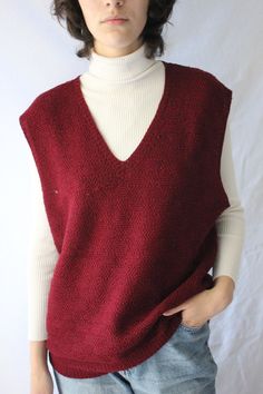 Vintage red v neck knit basic vest gilet 1980s, size L 🌿 Vintage Classic red Vest with V-Neck This splendid knitted vest with a V-neck is the perfect addition to your everyday style.  🧣 Classic Design: The V-neck design adds a stylish and practical touch to your ensemble.  Great Gift Idea: 💼 Versatile Style: Pairs well with various wardrobe items, from shirts to T-shirts. This vest adds a finishing touch and sophistication to your everyday life. Enrich your wardrobe with practical style using Casual Red V-neck Vest, Red V-neck Sweater Vest For Winter, Red V-neck Knit Sweater Vest, Red Knitted V-neck Top, Red Knit Vest For Fall, Knitted V-neck Vest For Fall, Vintage V-neck Sweater Vest For Winter, Vintage Knit V-neck Sweater Vest, Red Vest Outfits For Women