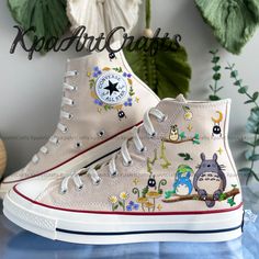 Custom Anime Cartoon Character Embroidered Converse, Anime Fan Custom Shoes, Converse Embroidered Flower, Custom Converse Chuck Taylor ❤️ WELCOME  ❤️   Thank you for visiting my store and taking the time to read these descriptions!!   The store's inventory will be regularly updated.      My store has been open since 2020. All of the items in the store are hand-embroidered by me. I can embroider patterns such as flowers, pets, mushrooms, and so on...   It is definitely a meaningful gift. I hope y Embroidered Chuck Taylors, Studio Ghibli Shoes, Embroidery Characters, Converse Flowers, Kidcore Fashion, Cute Converse Shoes, Flowers Shoes, Cute Converse