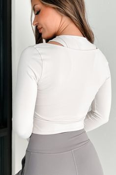 87% NYLON, 13% SPANDEX Brand: Le Lis Model Wearing Size Small Color: Light Stone Double-Layered Design (Layers Are Attached) Base Layer: High-Neck Crop Tank Top Layer: Long Sleeve Cross-Over Top Fitted Silhouette Cropped Length Top Has Stretch 18" Armpit To Sleeve End 9" Armpit To Hemline For Model Size Specs Please Check Size Charts Launched: 12/6/23 Spring Fitted Yoga Tops, Stretch V-neck Top For Yoga, Beige Stretch Athleisure Top, High Stretch V-neck Yoga Top, High Stretch V-neck Workout Tops, Fitted Beige Workout Top, Versatile Yoga Tops For Spring, Versatile Spring Yoga Tops, White V-neck Top For Yoga