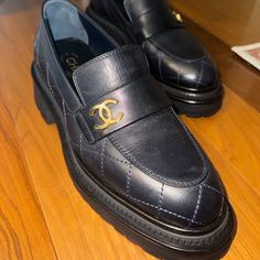 New Chanel Calfskin Leather Quilted Cc Platform Loafers 37.5 Navy Blue Black - Size 37.5 - Navy Blue Quilted Calfskin With Black Platform Bottoms - Gold Hardware (Chanel Cc Logo) - 100% Authentic - These Shoes Are Too Small For Me And Have Been Sitting In My Closet. I'm A True Size 38.5 Shoe And Wanted These To Fit So Badly But They Are Too Small. I Only Wore Them Twice Around My House. - Comes With Dust Bag - Comes From A Smoke-Free Environment Chanel Platform Loafers, Blue Black Color, Platform Loafers, Black Platform, Cc Logo, Chanel Shoes, My House, Gold Hardware, Calf Skin