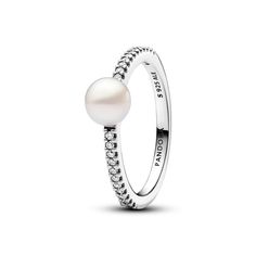 Embrace cool tones with the Pandora Timeless Treated Freshwater Cultured Pearl & Pavé Ring in sterling silver. This classic piece features a squared band with a concave section, showcasing a treated freshwater cultured pearl surrounded by sparkling cubic zirconia Pavé. Each unique pearl symbolizes beauty, wisdom, and love, making this ring a perfect addition to the Pandora Timeless collection. Please note each treated freshwater cultured pearl is unique and can vary in size and colour; normal wear and tear may occur with this material. Our freshwater cultured pearls are treated with bleaching and lustre enhancement. Pandora Pearl, Pandora Ring, Zierlicher Ring, Engagement Rings Bridal Sets, Engagement Ring Guide, Pandora Rings, Bridal Ring Sets, Bracelet Cuir, Pave Ring