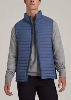 About Our Tall Men's Packable Puffer Vest Bring essential warmth on the go with our tall men's packable puffer vest. Designed specifically for guys from 6’3 to 7’1, this vest is long enough for your torso without being baggy. It’s been tailored with a modern fit that can be worn over any long sleeve polos or tees. The full zip makes it easy to customize your personal climate while the tall collar helps to block cool breezes. Insulated with lightweight poly fill, this vest jacket for tall men add Athleisure Summer, Cozy Sleepwear, Tall Men, Summer Lookbook, Sports Blazer, Long Sleeve Tee Shirts, Suit Shop, Athletic Pants, Tall Guys