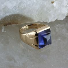 Vintage 14K Yellow Gold Blue Sapphire Ring, synthetic deep blue rectangular high dome cabochon, 11x9mm, 9/16 inches across, ring size 7.5, Circa 1950, 7.5 grams SKU # BB256R10 Most rings are sizable for a small fee. If the ring you are considering is the incorrect size contact us for a quote. This listing contains photographs of the actual item you will receive. Our items are in excellent condition with little or no signs of wear and many are one of a kind pre-owned estate finds. Please look clo Gold Blue Sapphire Ring, Diamond Accent Ring, Blue Sapphire Ring, Gold Filigree, Blue Sapphire Rings, Blue Band, Onyx Ring, Fine Jewelry Designers, Boston Ma