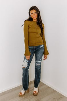 - Give your OOTD a touch of trendy flair with this cutie! - Unlined tight knit material with a ribbed texture - A round neckline - Long bell sleeves - A figure flattering silhouette that ends in a straight hemline Chic Stretch Knit Top With Ribbed Neckline, Ribbed Stretch Knit Top, Stretch Ribbed Knit Top, Spring Stretch Knit Long Sleeve Top, Stretch Knit Long Sleeve Top For Fall, Knit Stretch Long Sleeve Top For Fall, Stretch Knit Top With Ribbed Neckline, Chic Stretch Tops With Ribbed Cuffs, Spring Stretch Ribbed Knit Top