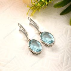 Aquamarine Earring    Large Oval cut Aquamarine dangle, Ocean blue gemstone drop earrings, gift for her, gift for mom, March birthstone,925 Sterling Silver Dangle  teardrop  created Gemstone earrings gemstone-10x14mm <> Some basic benefits of wearing Aquamarine Gemstone: Attracts money. Brings good fortune. Financial abundance. Protects from negative energies. Cleanses all evil thoughts. Stability in married life. Improves communication. Boosts self-confidence. FREE SHIPPING AND USPS TRACKED PARCELS WORLDWIDE. Our products are totally handmade and made with high quality gemstones and 925 solid sterling silver If you believe in buying top quality products for yourself and for your family and friends, SE is the place where you want to be There are unique pieces, handcrafted to perfection wit Exquisite Aquamarine Jewelry Gift, Exquisite Aquamarine Jewelry As Gift, Exquisite Aquamarine Jewelry For Gift, Fine Jewelry Aquamarine Hallmarked, Elegant Aquamarine Nickel-free Earrings, Fine Jewelry Aquamarine Earrings For Formal Occasions, Teardrop Topaz Jewelry Gift, Formal Aquamarine Earrings Fine Jewelry, Teardrop Topaz Jewelry For Gift