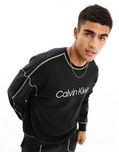 Hoodies & Sweatshirts by Calvin Klein Call off the search Crew neck Logo embroidery Contrast stitching Relaxed fit Calvin Klein Crew Neck Sweatshirt With Ribbed Cuffs, Calvin Klein Sporty Sweatshirt With Ribbed Cuffs, Calvin Klein Sweatshirt With Ribbed Cuffs For Streetwear, Calvin Klein Relaxed Fit Sweatshirt For Fall, Calvin Klein Winter Sweatshirt With Ribbed Cuffs, Calvin Klein Casual Relaxed Fit Sweatshirt, Calvin Klein Crew Neck Tops For Loungewear, Calvin Klein Relaxed Fit Winter Top, Calvin Klein Relaxed Fit Tops For Winter