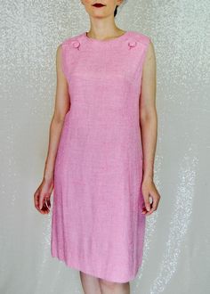 This lovely 60s pink shift style dress would make a great spring and summer staple - an easy piece to transition from work to an evening out, just with a few changes in your accessories! The piece zips up the back with a metal zipper. The label is for "Stacy Ames one of the four sister" - a really interesting brand and fun to collect all "sisters names". Would likely best fit a modern Medium. BUT please see measurements below as this is meant to be a somewhat loose shift style fit. For reference Summer Staples, Dress Form, Metal Zipper, 1960s Vintage, Dress Clothes For Women, Style Dress, The Four, Shift Dress, The Dress