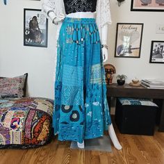 So cute! Long maxi boho skirt with patchwork flower prints. Supersoft materials, with drawstring waist.  Drawstring waist 14" across laid flat or 28" around.  Would fit 24" to 32" waist.   Length 38" 100% Rayon - nice soft breathable material Hand Wash Lay Flat to Dry Boho Rock, Boho Patchwork, Boho Skirt, Patchwork Skirt, Boho Skirts, Long Maxi, Waist Length, Flower Prints, Drawstring Waist