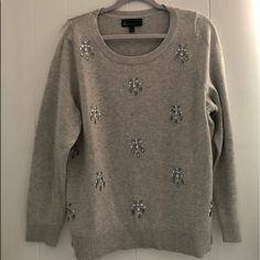 Winter Sweater Gray Winter Sweater With Jeweled Appliqus Never Worn In Fantastic Condition Elegant Silver Winter Top, Elegant Silver Tops For Winter, Batwing Cardigan, Flowy Cardigans, Olive Green Cardigan, Brown Knit Sweater, Ruffle Sleeve Sweater, Light Cardigan, Gray Winter