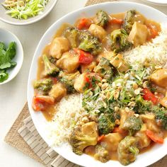 a white plate topped with rice and veggies