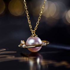 This Pearl Trending Fashion Necklace is a modern style necklace with anti-allergic and durable finish that makes it blend with any outfit. قلادات متدلية, Saturn Necklace, Single Pearl Necklace, Female Outfits, Planet Necklace, Real Pearl Necklace, Pearl Drop Necklace, Silver Bodies, Long Pearl Necklaces