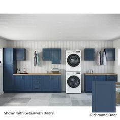 an image of a laundry room with blue cabinets and washer dryer in it