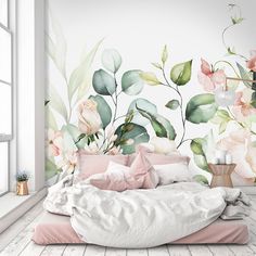 a bedroom with flowers and leaves painted on the wall