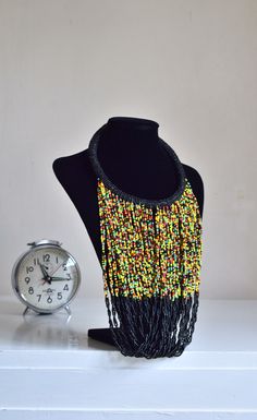 Unique African Maasai Handcrafted Beaded Necklace with an Elegant Look and Brilliant Finish. **GET FREE SHIPPING FOR ADDITIONAL ITEMS PURCHASED. Yes, Buy Multiple Items and pay shipping for 1 item only- The rest ships Free. (No Limits on the number of Multiple items). With a faster delivery time of 3 days via DHLExpress, Worldwide. Ordinary/Standard Shipping also available upon request. We Custom Make to Suit Your Taste. Available In All Colors and Sizes. For wholesale please chat me up for disc Woman Necklace, Rasta Colors, Handmade Beaded Necklace, Rope Jewelry, Ethnic Necklaces, Color Necklace, Handmade Beaded Necklaces, Beaded Rope, Maasai