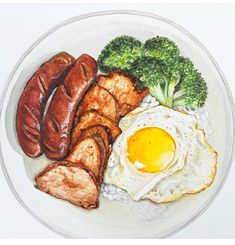 a white plate topped with sausage, eggs and broccoli on top of it