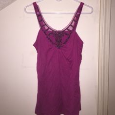 Embroidered Tank Top Embroidered neck like tank top from Charlotte Russe - brand new with tag - measures 28" from shoulder to hem - sheet front behind beading - 100% viscose - hand wash/lay flat to dry - color is a dark pink/purple Charlotte Russe Tops Tank Tops Purple Embellished Sleeveless Top, Purple Cotton Party Top, Fitted Embroidered Purple Tops, Fitted Purple Embroidered Tops, Embroidered Tank Top, Embroidered Tank, Dark Pink, Charlotte Russe, Lay Flat