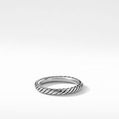 a silver ring on a white background