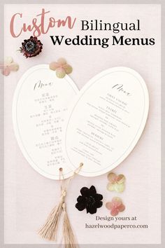 the wedding menu is laid out with flowers and tassels