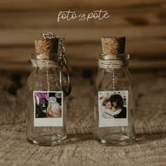 two small glass jars with pictures on them