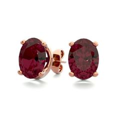 These classic stud earrings feature two 8x6mm oval shape garnet gemstones. Each stone measures approximately 1.50 carats for a total approximate weight of 3.00 carats. These earrings are in 14 karat rose gold over sterling silver and have comfortable and secure post with friction backs. Size: 8 mm x 6 mm.  Color: Red.  Gender: female.  Age Group: kids. Garnet Gemstone, 3 Carat, Oval Shape, Gender Female, Womens Watches, Garnet, Women's Earrings, Jewelry Watches, Age Group