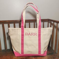 "Monogrammed Medium Tote, Personalized Canvas Tote Bag, Personalized Pet Bag, Monogram Grandma Tote, Baby Diaper Bag Great Bridesmaid Gift, Baby Gift, Host/Hostess Gift! FREE SHIPPING! Choose a Monogram, Name or make it your own with any wording you like. You are not limited to the fonts shown. Message me for more options! 12\" H x 18\" W x 5.5\" D 1.85 lbs 18 oz Canvas Top zip closure Self constructed canvas handle in contrasting trim color Spacious interior with flat bottom I keep a few colors in stock but they are available with straps in the following colors. I can usually have them in a week and ship within another week. Send me a message for more information. Red               Orange          Coral Pink  Black            Hot Pink         Maroon Natural         Emerald         Turquoi Personalized Canvas Tote, Violet Brown, Yellow Violet, Pet Bag, Navy Baby, Personalized Canvas, Contrasting Trim, Orange Coral, Black Hot Pink