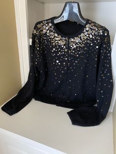 Designer One Girl Who cardigan Sweater in Black with cooper space designed sequin accents, Size L, front snap closure, casual as well as dressy,  perfect condition ever worn.     21 inch chest, 22 inch shoulder to hem,  22 inch sleeve length Sequin Sweater, New Glasses, Pink Swirls, First Girl, Cardigans For Women, Cardigan Sweater, Snap Closure, Sweater Outfits, Sweater Cardigan