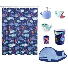 the bathroom is decorated in blue and has an octopus shower curtain, cup holder, toothbrush