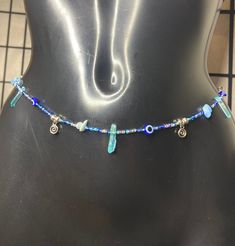 Boho Hippie Blue Evil Eye Beads with Natural Aquamarine Gemstones & Blue Quartz Pillar Rock Crystals Stones Waist Beads Waist Chain Belly Chain  Silver Pendants & Detailing  Body Jewellery  Silver screw clasp Made to fit Waist line / Upper hip line / hip line  Check out more of my waist Beads collection 🤍 https://etsy.me/3JbHvCJ Blue Gemstone Beads Jewelry For Beach, Bohemian Blue Gemstone Beaded Necklaces, Blue Bohemian Beaded Gemstone Necklace, Bohemian Blue Gemstone Beaded Necklace, Blue Beaded Necklaces With Stones For Jewelry Making, Blue Bohemian Beaded Necklaces With Stones, Bohemian Blue Beaded Necklaces With Stones, Blue Gemstone Beads Festival Bracelet, Blue Beaded Chain Bracelets For Party