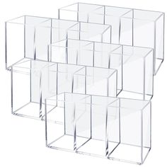 six clear acrylic cubes stacked on top of each other, with one in the middle