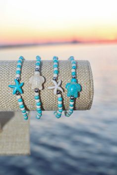 Stretchy & Stackable Bracelets, Synthetic Turquoise Starfish & Turtle Beaded Stretch Bracelets🦈  Inner Diameter: 2-1/4 inch(5.7cm) Turquoise Beaded Bracelets With Starfish Charm, Bohemian Turquoise Starfish Beaded Bracelets, Turquoise Starfish Beaded Bracelets, Ocean-inspired, Ocean-inspired Turquoise Bracelet With Starfish Charm, Turquoise Ocean-inspired Bracelet With Starfish Charm, Ocean-inspired Turquoise Starfish Beaded Bracelets, Handmade Turquoise Starfish Bracelets, Turquoise Beaded Starfish Bracelets For Summer, Turquoise Starfish Beaded Bracelets For Summer