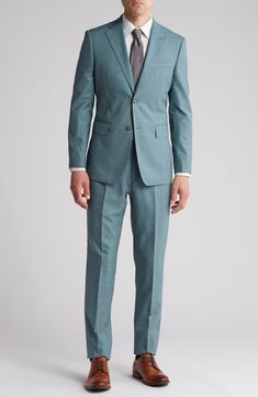 A handsome grid print elevates this trim-fit suit tailored from a wool blend with a hint of stretch and notched lapels. 36 1/4" inseam; 7 3/4" leg opening; 10 1/2" rise (size 38R) Jacket has notched lapels; chest welt pocket; front flap pockets Unhemmed Lined 90% wool, 10% polyester Dry clean Imported Semiformal Outfits For Men, Summer Semi Formal Wedding Guest Attire Men, Garden Party Mens Attire, Men’s Suit Wedding, Non Traditional Wedding Suit, Teal Suit Men, Garden Party Suit, Colorful Mens Suits, Mens Summer Cocktail Attire