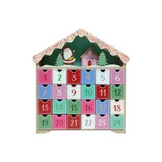 a wooden calendar with numbers and santa clause on the top, sitting in front of a white background