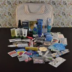 the contents of a travel bag are neatly packed and ready to be taken out on the table