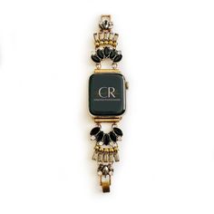 Dress up your everyday look with one of our custom-made jewelry watch bands! This is sure to be a gift that will please the girl who has everything or maybe just wants everything. This Multi-toned gold, black onyx and crystal statement bracelet Apple Watch Band is one of Copper Robin's best-selling bands. Available in Apple watch sizes 38mm, 40mm, 41mm, 42mm, 44mm, 45mm, 46mm, and 49mm It will fit all series of apple watches. Series 1-10 and SE. Available in Rose Gold, Gold, and Silver. Sizing: Elegant Metal Watch Bands As Gift, Timeless Black Watch Band As Gift, Elegant Adjustable Apple Watch Band, Luxury Adjustable Bracelet Strap Jewelry And Watches, Adjustable Metal Elegant Watch Bands, Elegant Black Metal Watch Accessories, Luxury Black Metal Watch Accessories, Vintage Adjustable Bracelet Strap Apple Watch Band, Black Metal Watch Accessories With Bracelet Strap