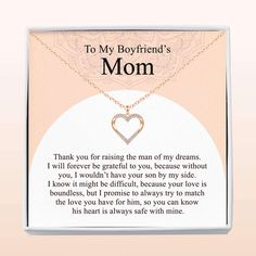 a mother's necklace with a heart shaped pendant on it, and the words to my boyfriend's mom